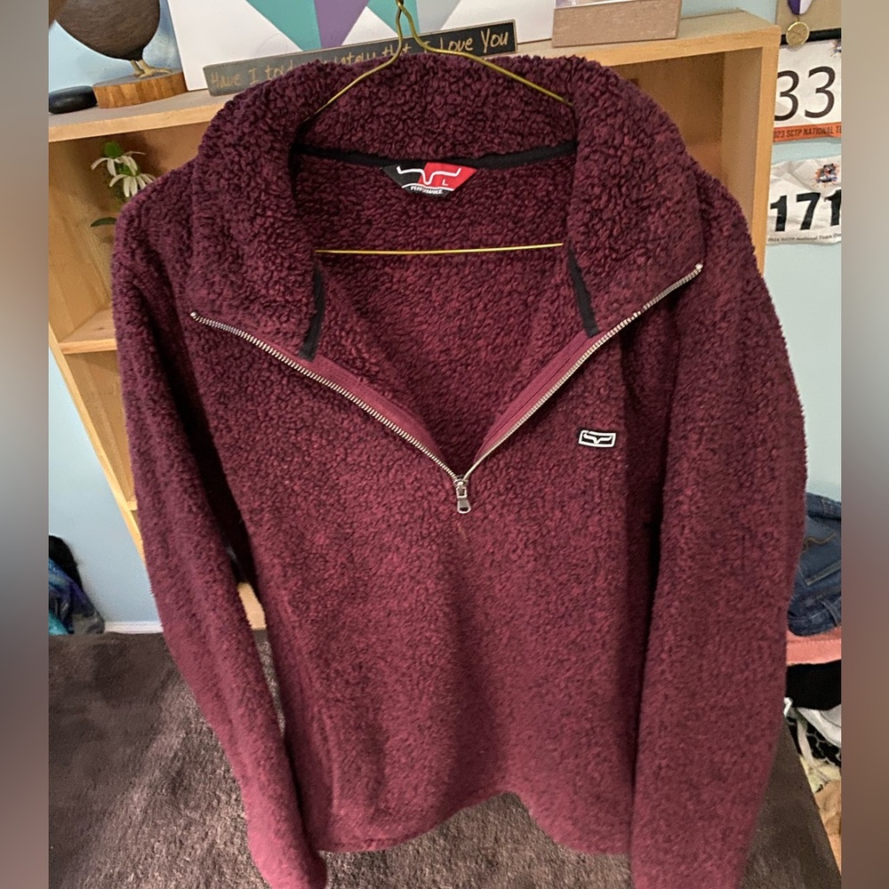 This is a burgundy Kimes Ranch Jacket